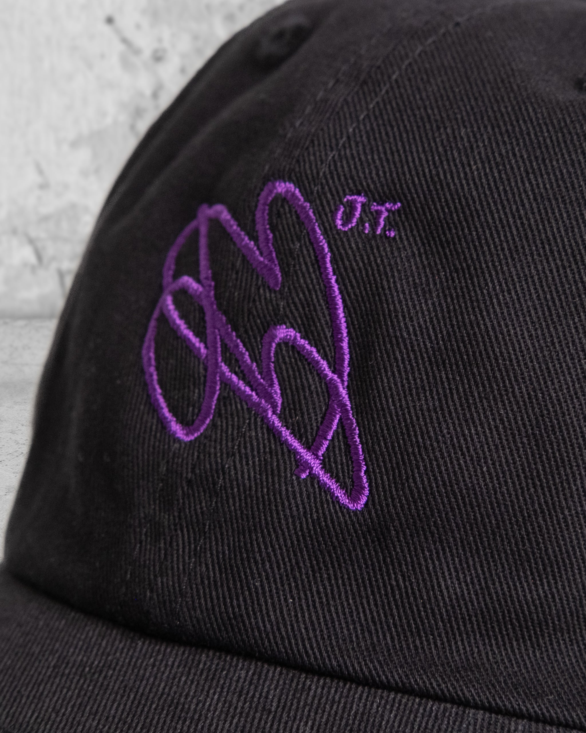 Cap KRINGEL schwarz / lila